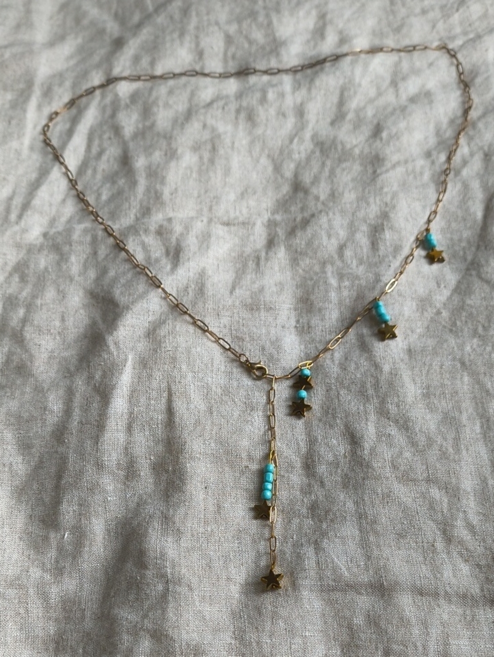 Brass Tone Chain Lariat Style Necklace with Faux Turquoise Beads & Star Charms